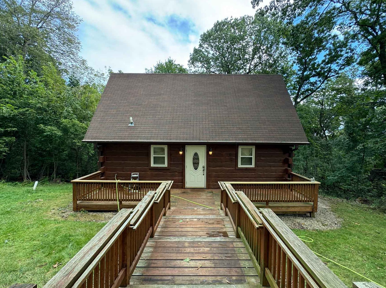 Deck Restoration 12 A Cabin With A Deck Near The Trees