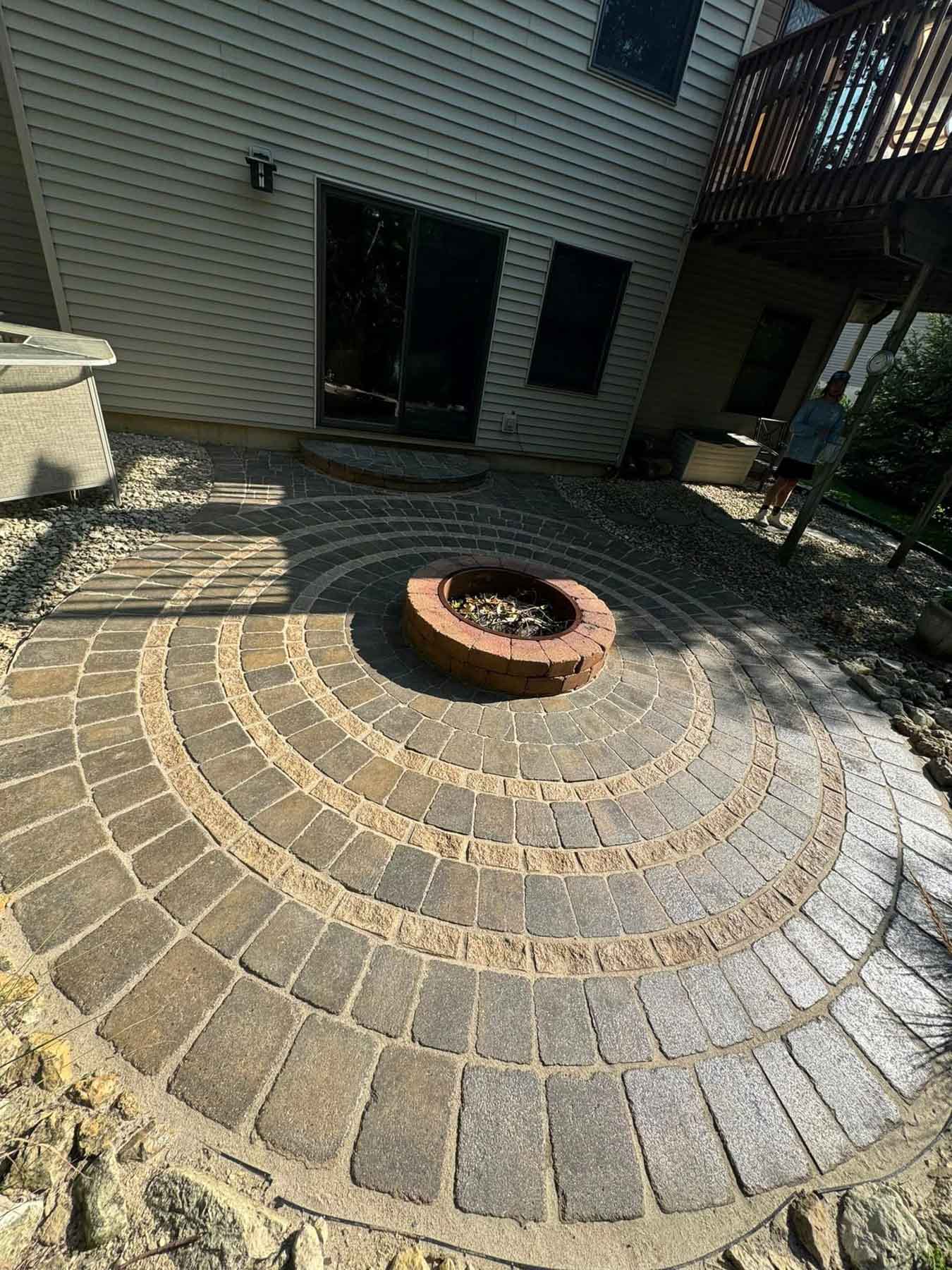 Paver Cleaning 43 Pavers Around A Fire Pit After Being Cleaned By Driftless Exteriors