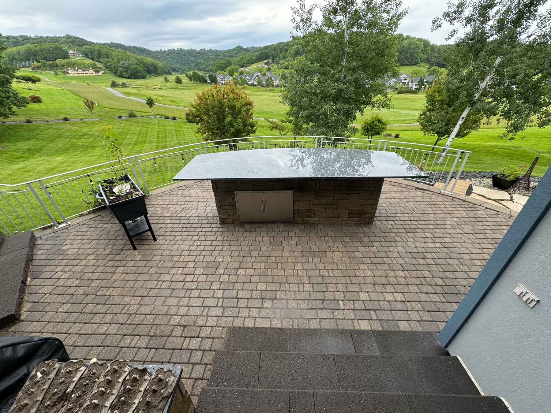 Patio Cleaning 41 Patio Behind A House After It Has Been Cleaned By Driftless Exteriors