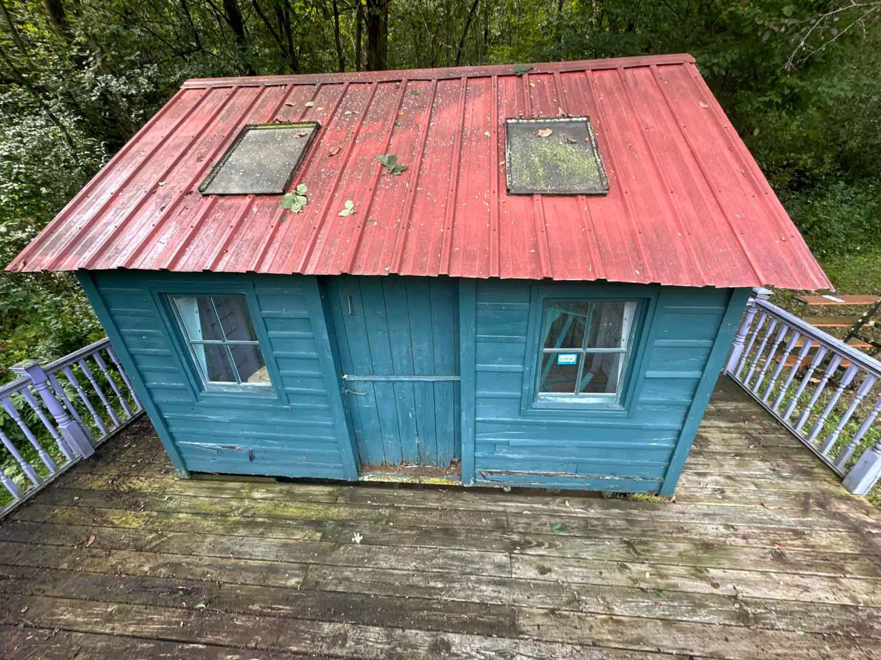 House Washing 22 Small Hut Before Being Cleaned By Driftless Exteriors